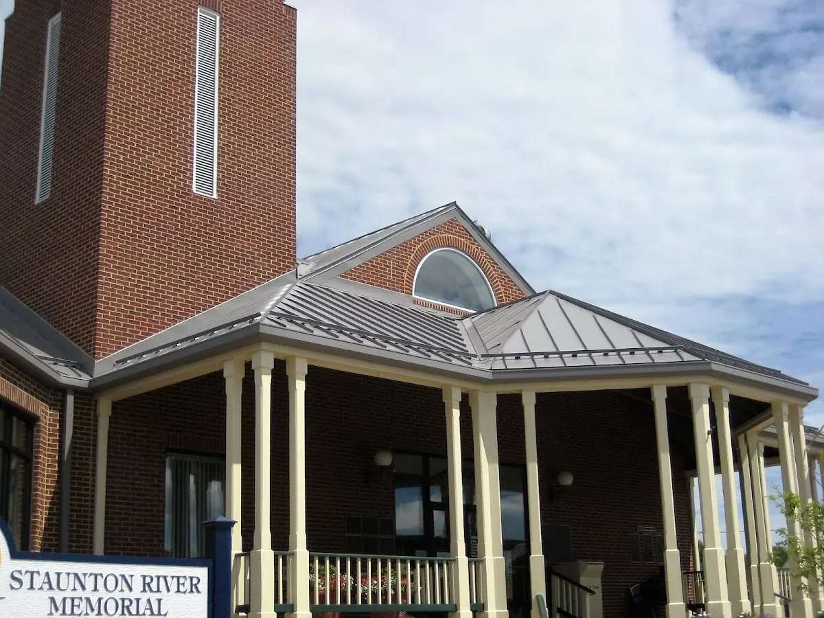 Skilled roofing craftsmen working on a residential roof in Saint Augustine